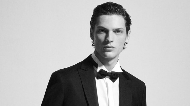 Valentin Caron dons a black tie look for Massimo Dutti.