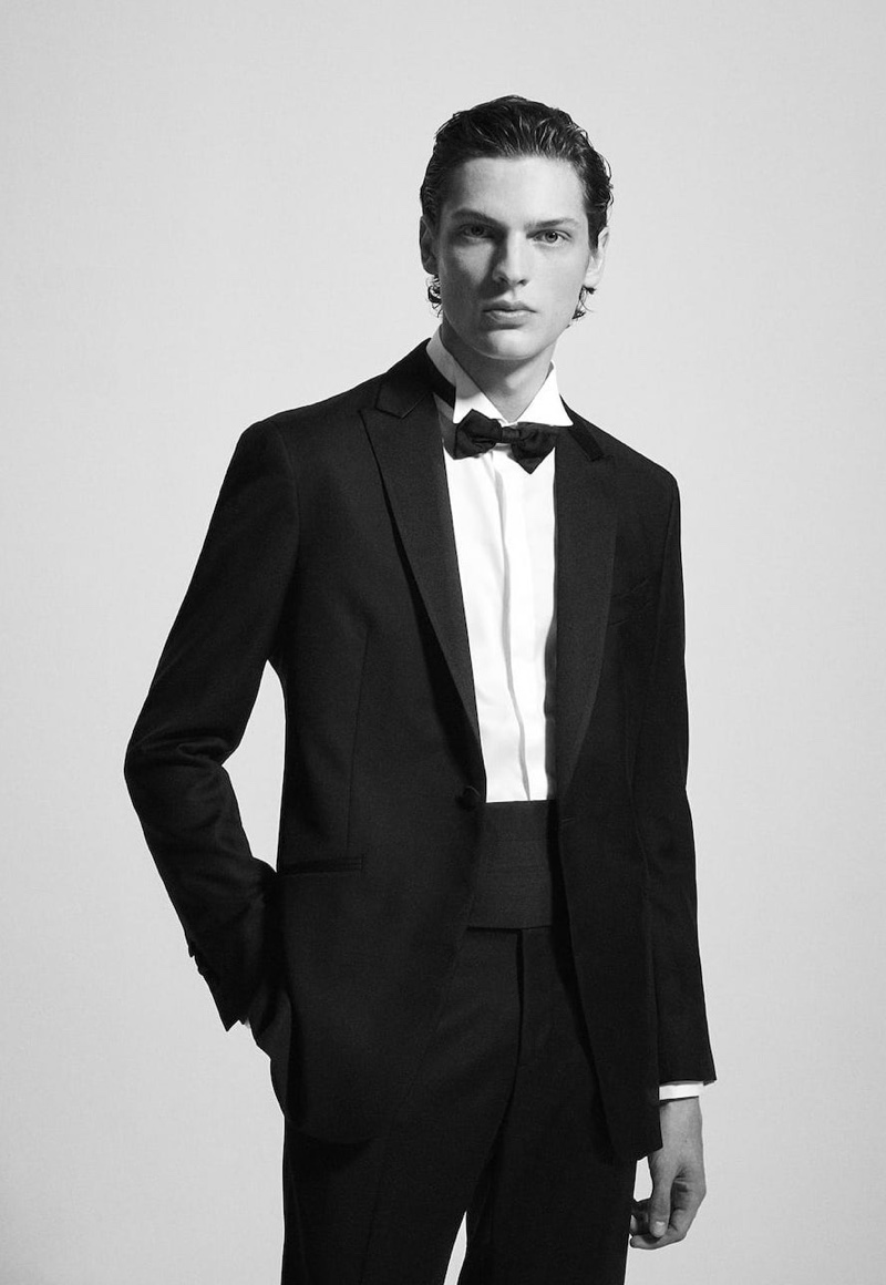 Valentin Caron dons a black tie look for Massimo Dutti.