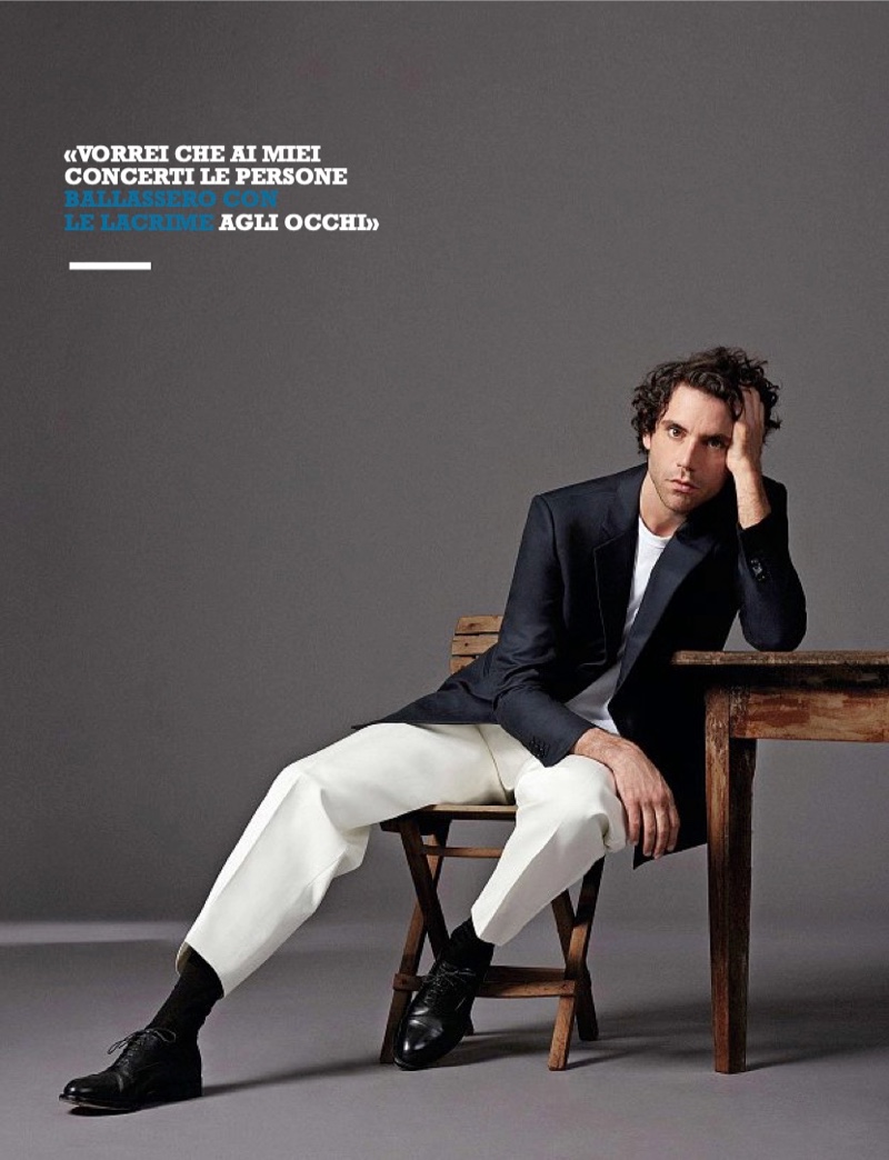 A chic vision, Mika sports a shirt and jacket by Giorgio Armani with Emporio Armani pants.