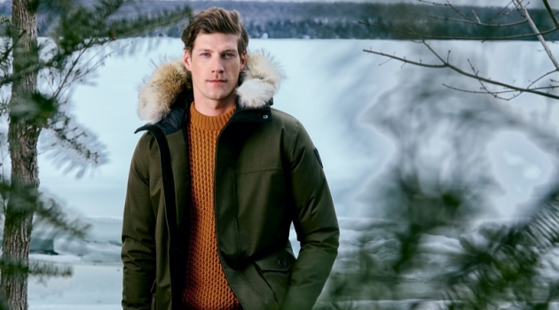 Sporting a green parka, Alex Loomans fronts Nobis' fall-winter 2019 campaign.