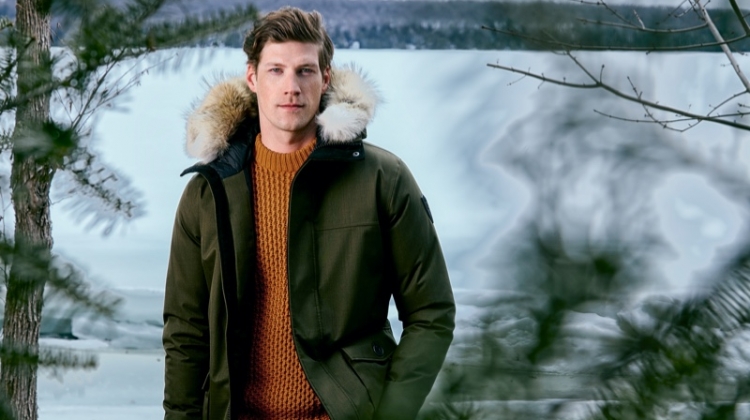 Sporting a green parka, Alex Loomans fronts Nobis' fall-winter 2019 campaign.