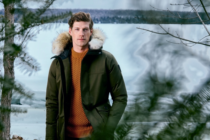 Sporting a green parka, Alex Loomans fronts Nobis' fall-winter 2019 campaign.