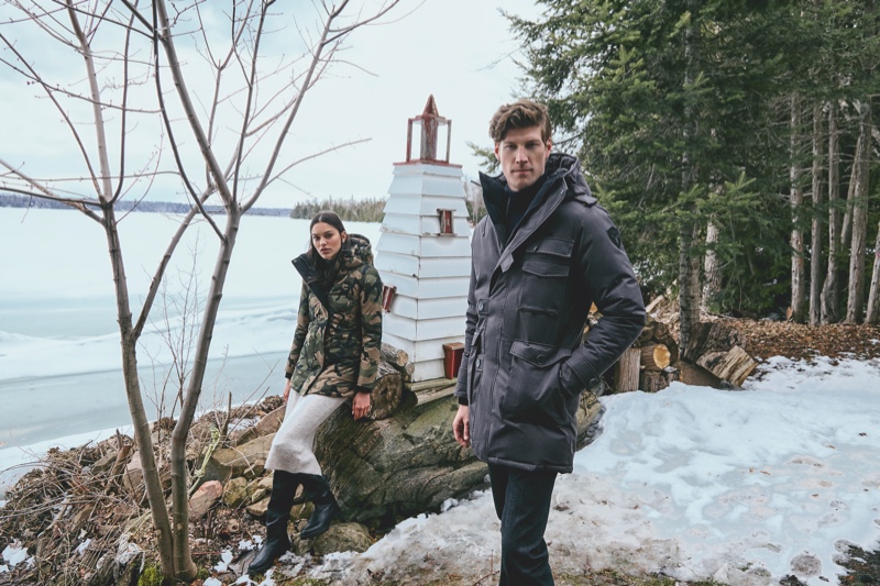 Keeping warm from the cold, Alex Loomans models a parka from Nobis' fall-winter 2019 collection.