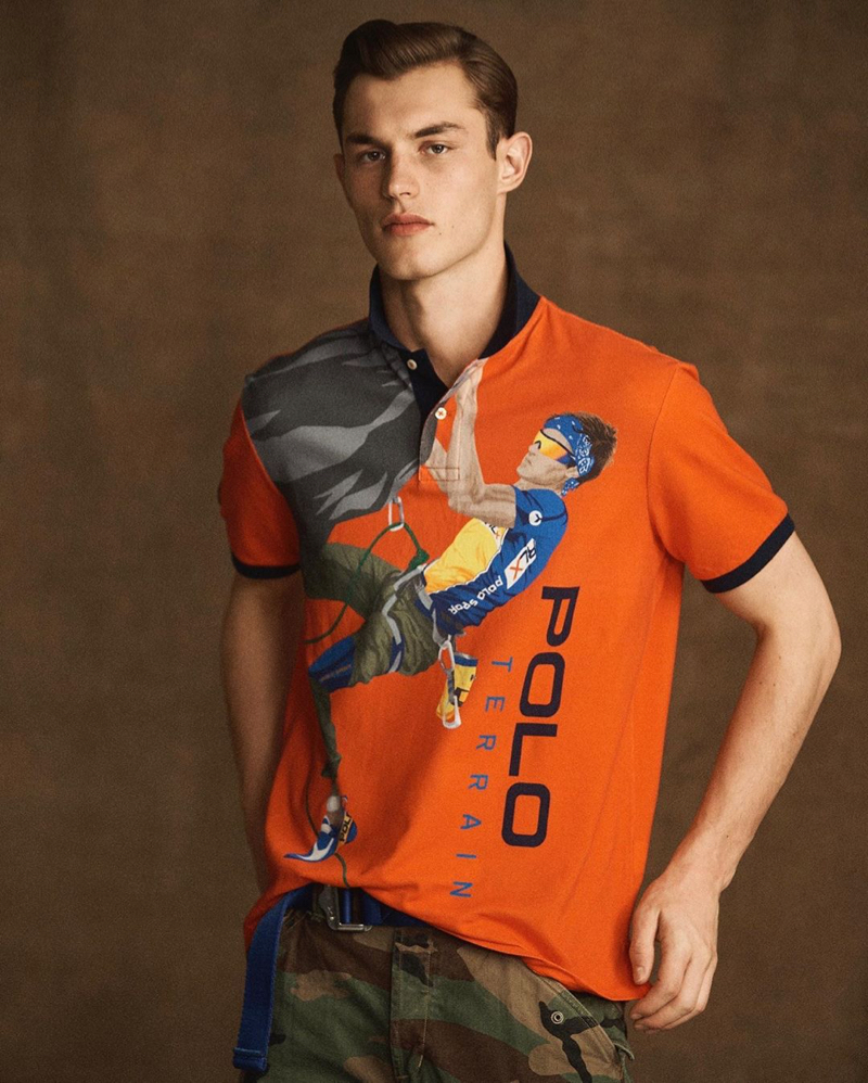 British model Kit Butler dons a graphic orange polo from the POLO Sport Ralph Lauren collection.