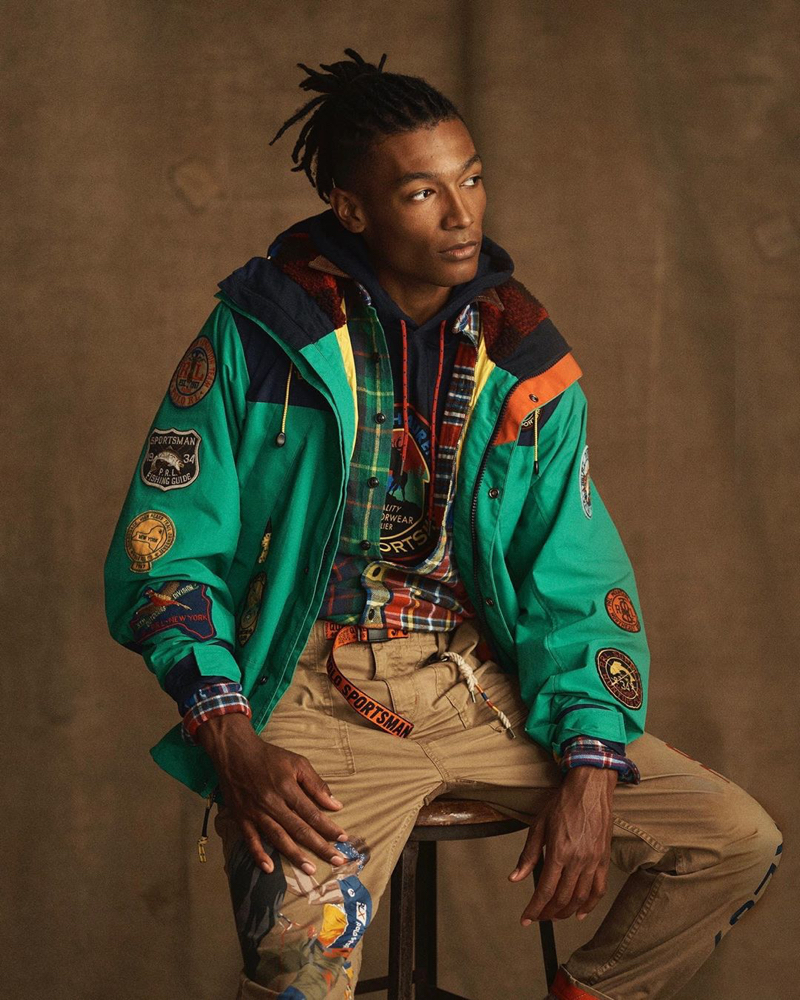 Embracing a pop of color, David De Jesus wears a parka and more from the POLO Sport Ralph Lauren collection.