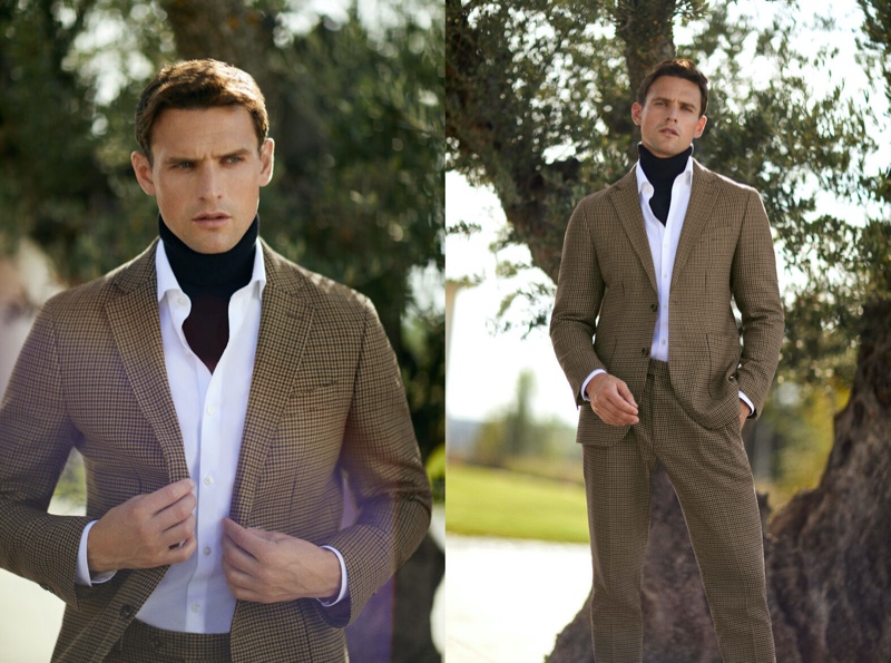 Easily inspiring, Guy Robinson elevates a suit from work to pleasure with the addition of a Pedro del Hierro sweater.