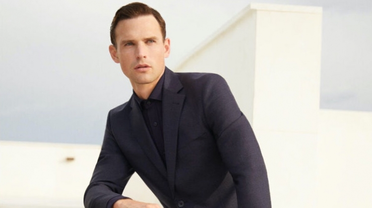 Ready for a date, Guy Robinson embraces monochromatic dressing in a tailored look from Pedro del Hierro.