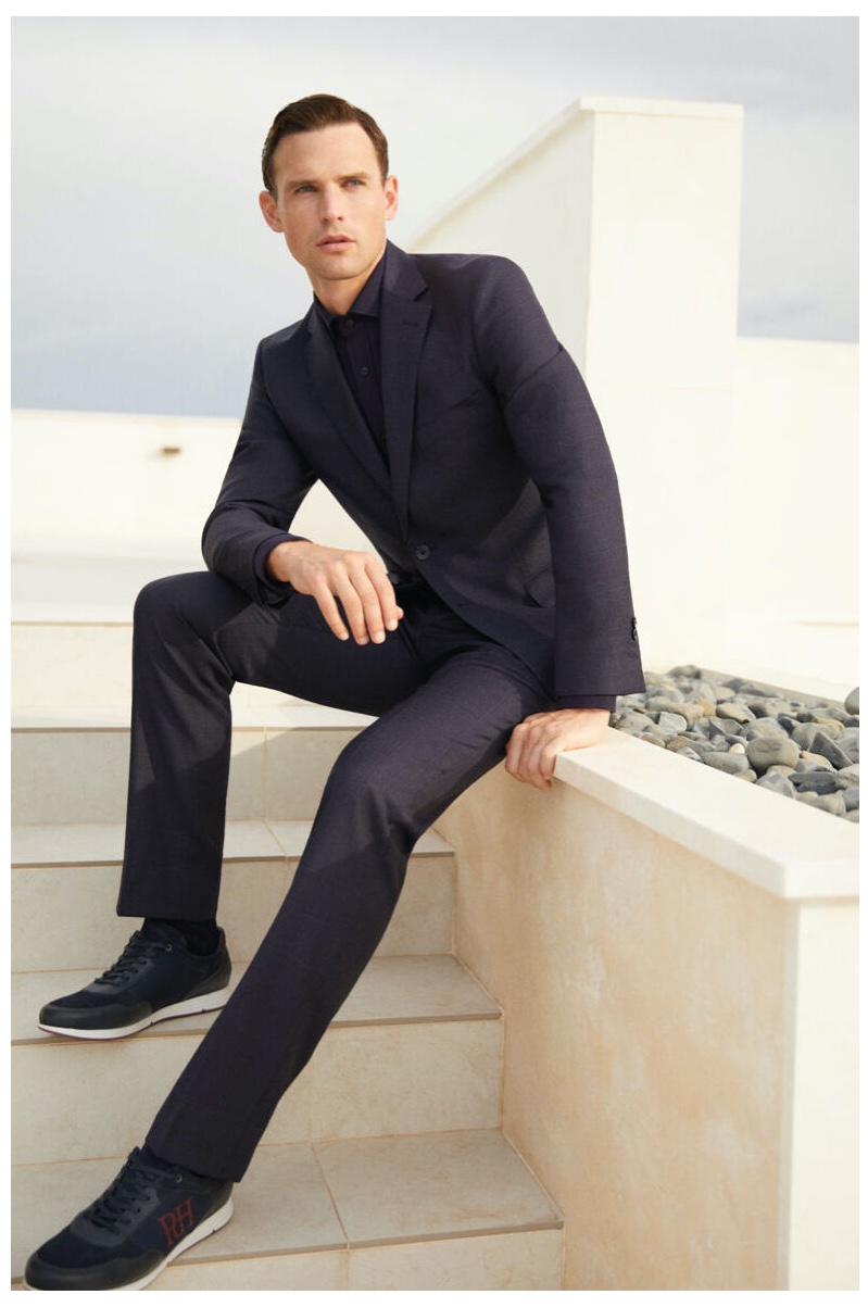 Ready for a date, Guy Robinson embraces monochromatic dressing in a tailored look from Pedro del Hierro.