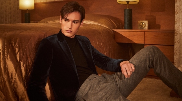 By Invite Only: Jegor Venned Dons Reiss Partywear Front and center, Jegor Venned sports a green velvet blazer with a wool sweater and checked trousers by Reiss.