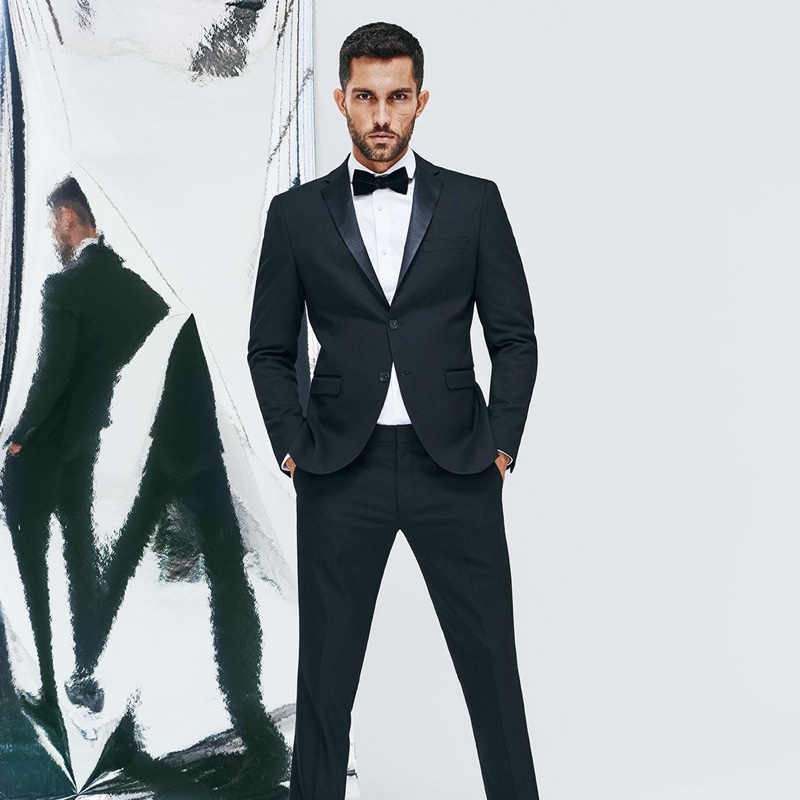 Tobias Sorensen dons a sleek tuxedo from Selected Homme.
