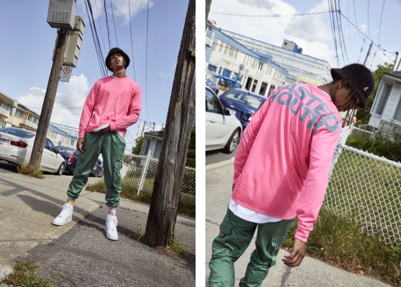 Sadjo Ka sports a long-sleeve pink shirt and green cargo pants from Djab.