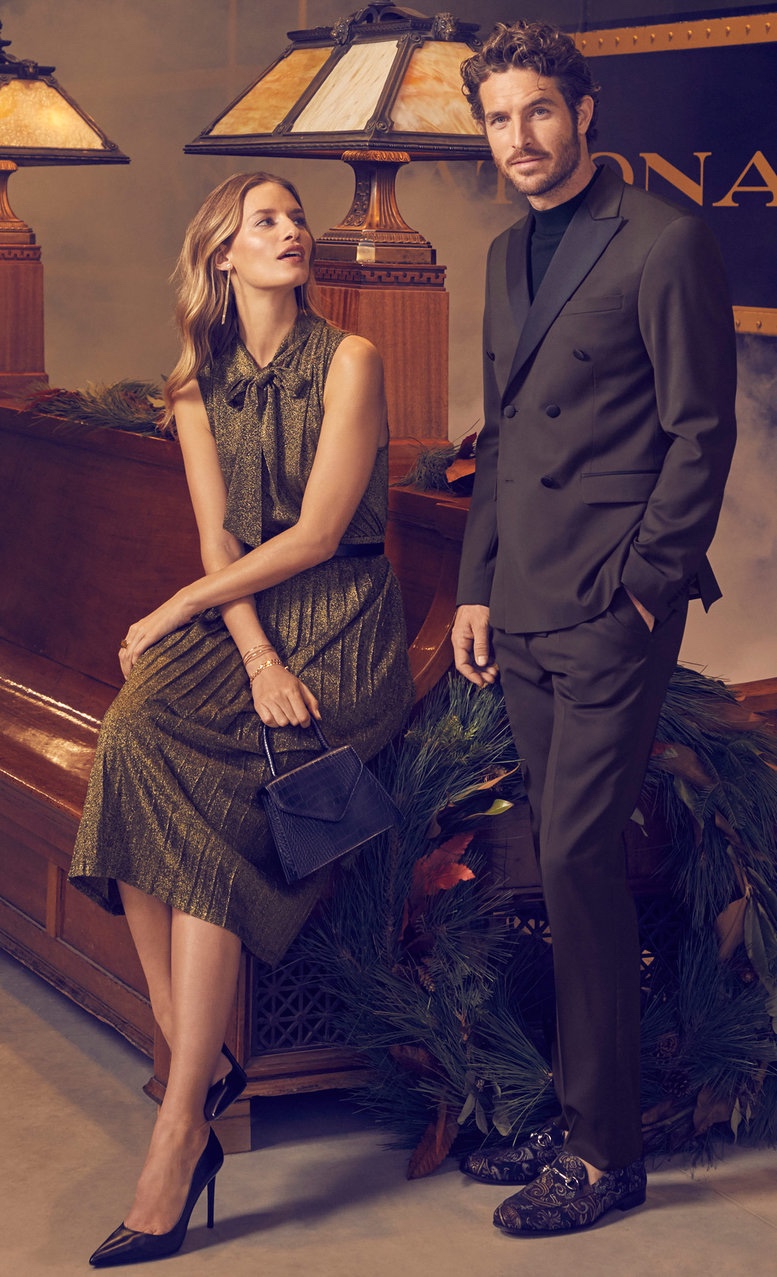 Models Linda Vojtová and Justice Joslin showcase dressy style for Simons' holiday 2019 campaign.