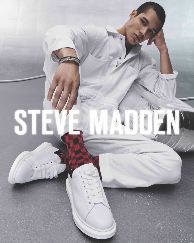 Clad in white, T.J. Moore fronts Steve Madden's holiday 2019 campaign.