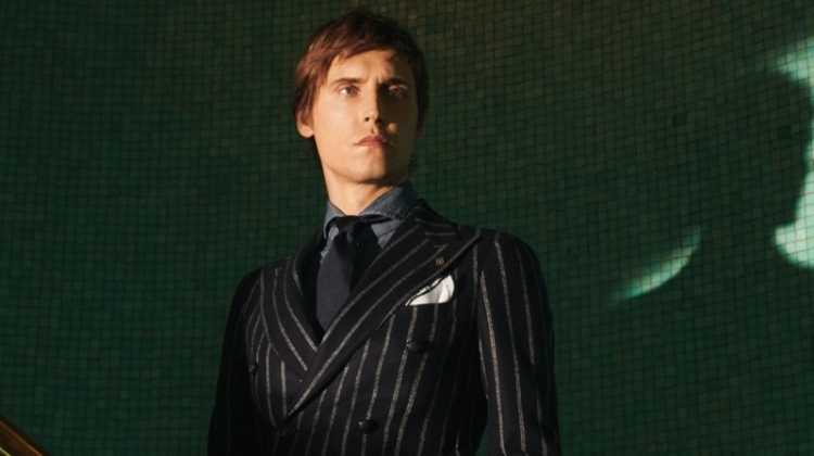 Sébastien Andrieu dons a pinstripe suit for Tagliatore's fall-winter 2019 campaign.