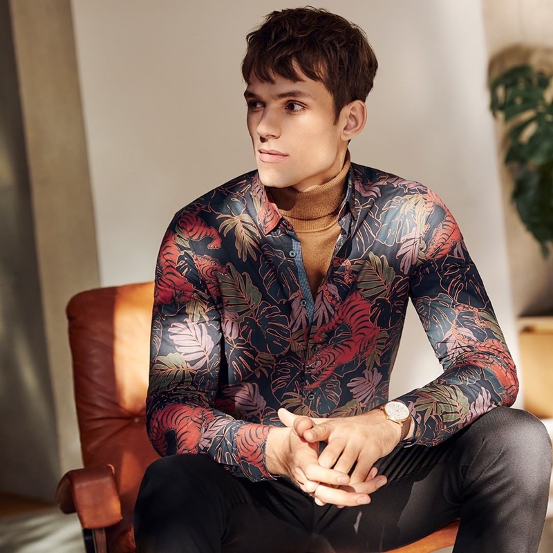 Embracing a graphic motif, Adrian Sotiris wears Ted Baker's tiger print shirt $165.