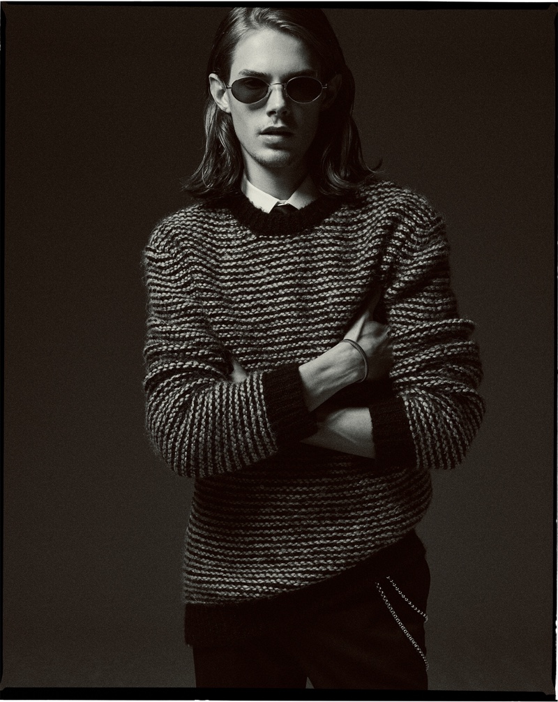Front and center, Niclas Koch wears knitwear by Zara.