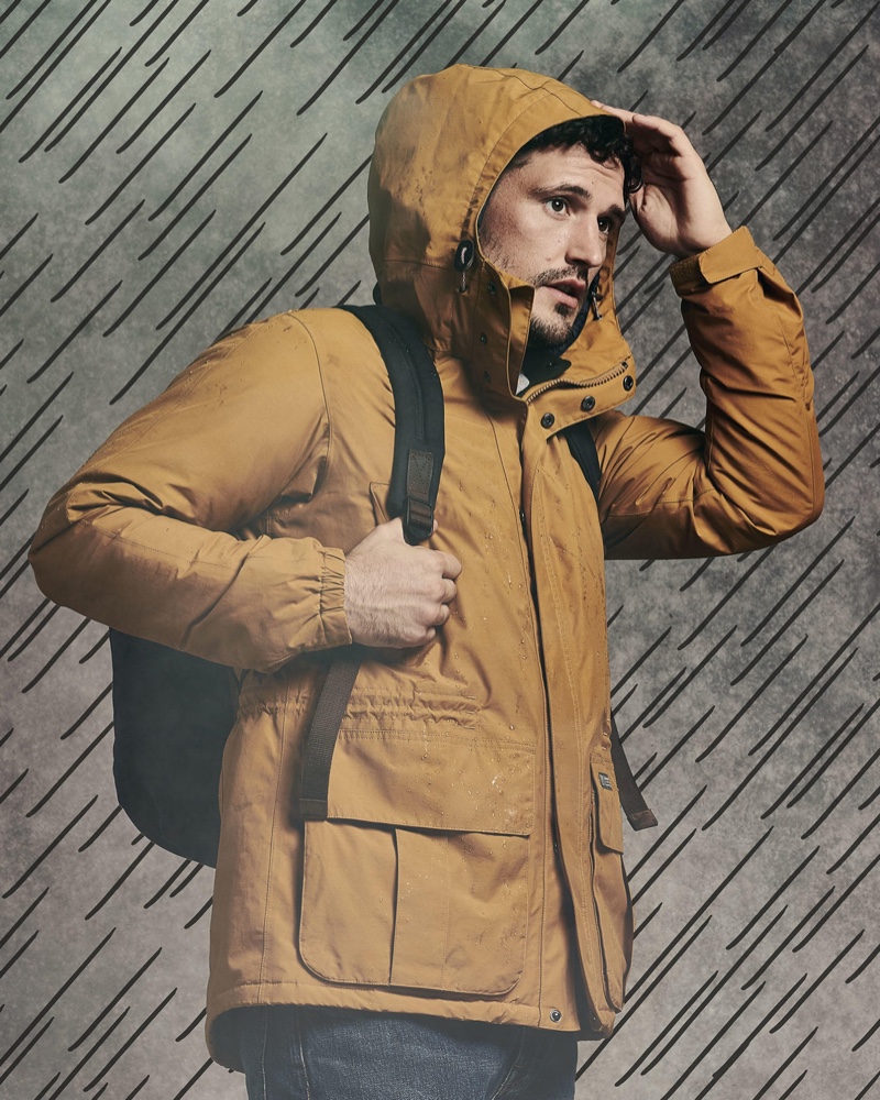 Front and center, Sam Webb keeps warm in a hooded jacket by Barbour.