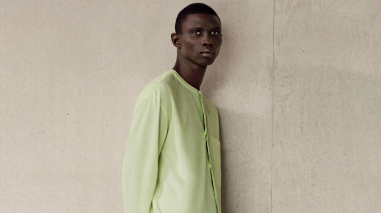 Fernando Cabral dons an oversized cotton tunic and lightweight trousers from COS.