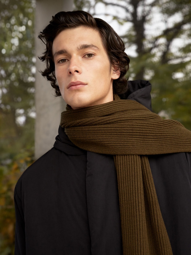 Anton Jaeger models a coat and scarf from COS.