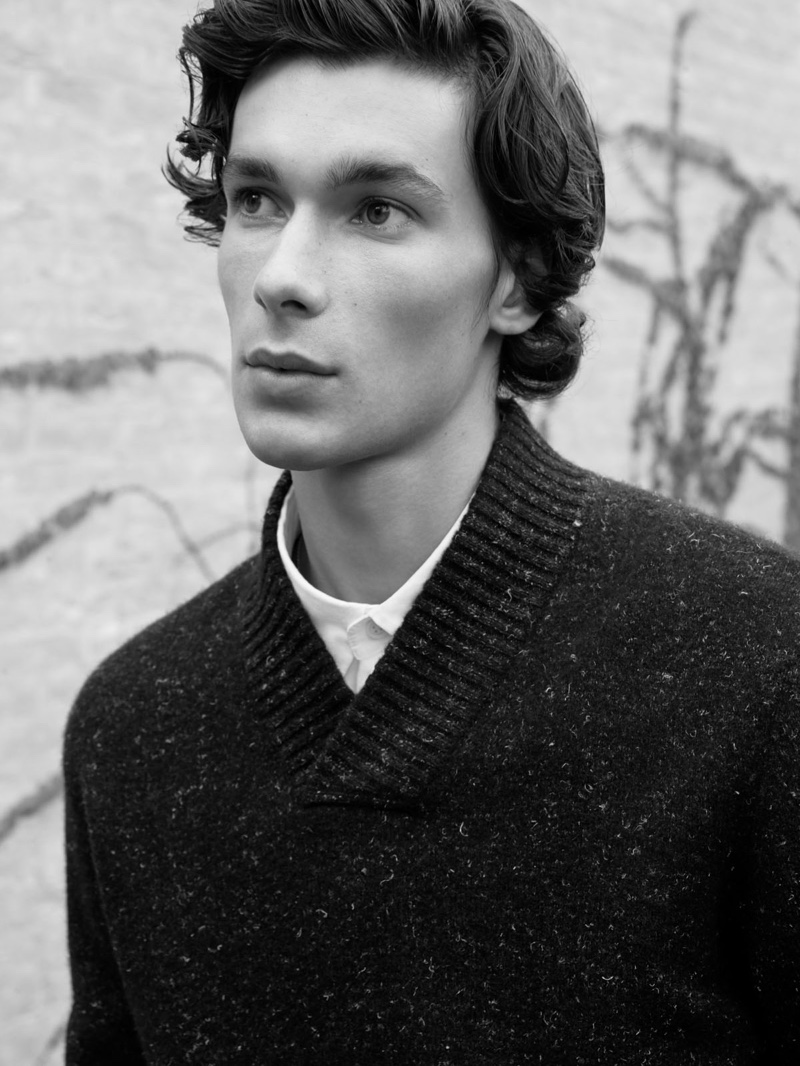 Front and center, Anton Jaeger sports a marle shawl-collar sweater from COS.