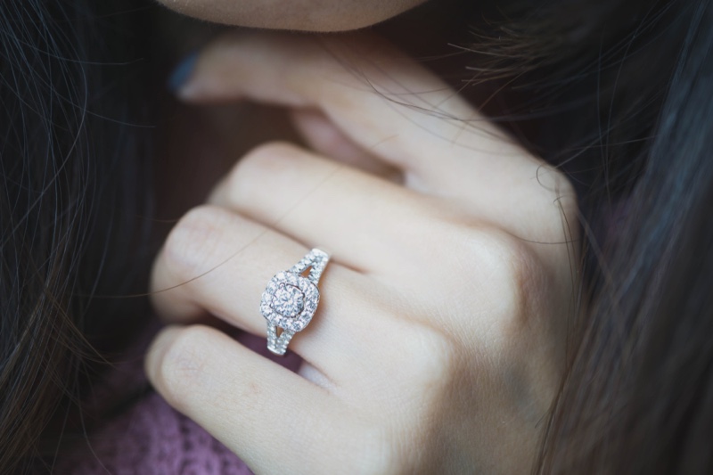 Closeup Diamond Engagement Ring Women's Hand
