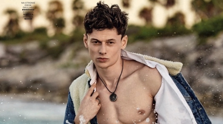 Poland’s Next Top Model Winner Dawid Woskanian Hits the Beach for Glamour