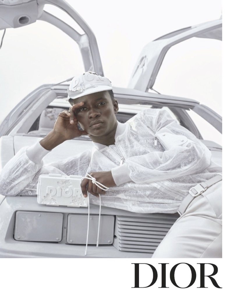 Serigne Lam sports an all-white look for Dior Men's spring-summer 2020 campaign.