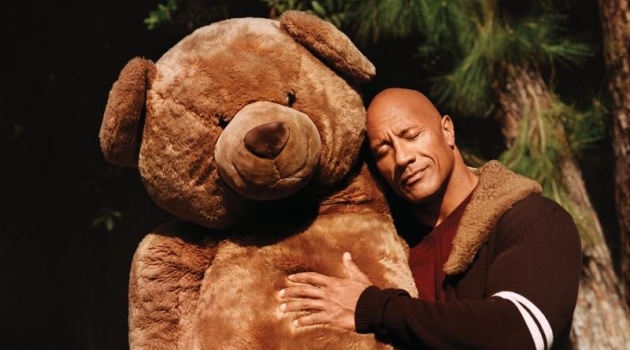 Dwayne 'The Rock' Johnson Shares Another Side with WSJ. Magazine Hugging a giant teddy bear, Dwayne "The Rock" Johnson sports a Dolce & Gabbana cardigan, Brioni sweater, and Double RL jeans for WSJ. magazine.
