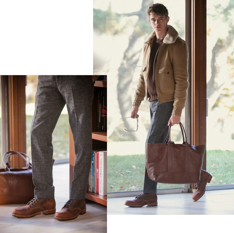A smart casual vision, Jordy Baan wears an AMI wool aviator jacket, Far Afield knit sweater, Vince tee, and Club Monaco glen plaid trousers. Persol Resina classic sunglasses, Wolverine 1000 Mile boots, and a Lotuff leather tote complete Jordy's look.