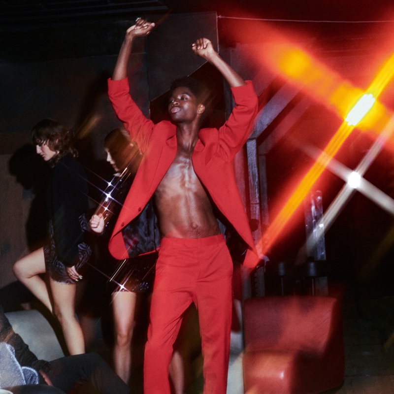 Standing out in a red suit, Alton Mason appears in HUGO's holiday 2019 campaign.