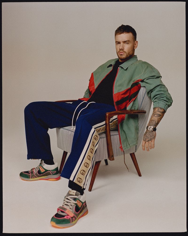 Front and center, Liam Payne sports a Gucci look with a Rolex watch for Têtu.