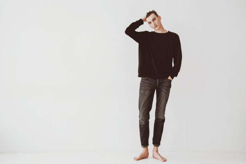 Man Black Sweater and Jeans Man Black Sweater and Jeans