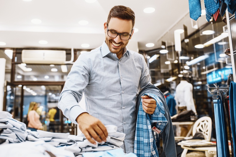 Man Smiling Shopping Clothing Store