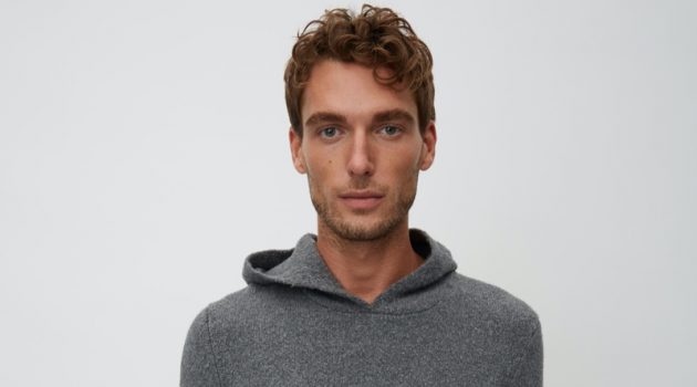 Nikola Jovanovic Celebrates a Green Christmas with Marc O'Polo Nikola Jovanovic wears a grey hooded knit from Marc O'Polo's Christmas collection.
