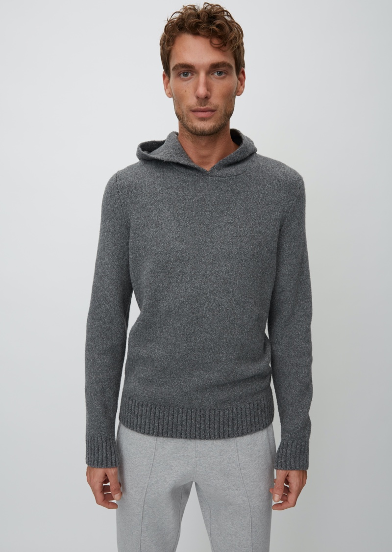 Nikola Jovanovic wears a grey hooded knit from Marc O'Polo's Christmas collection. » Nikola Jovanovic Celebrates a Green Christmas with Marc O'Polo Nikola Jovanovic wears a grey hooded knit from Marc O'Polo's Christmas collection.