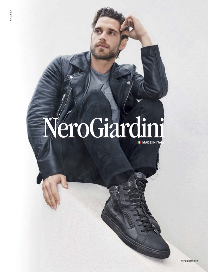 Simone Bredariol rocks black sneakers for Nero Giardini's fall-winter 2019 campaign.