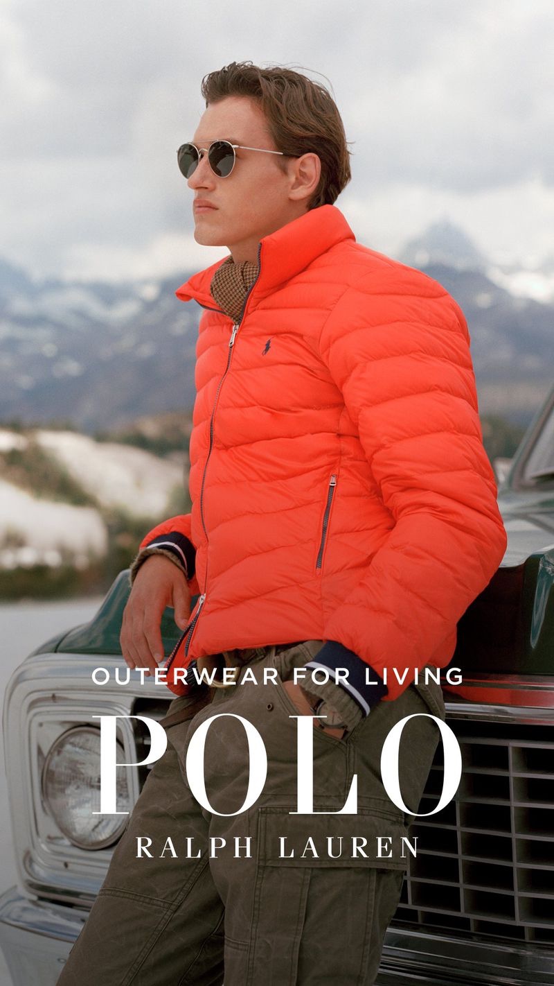 Sporting a orange quilted jacket, Jegor Venned stars in POLO Ralph Lauren's fall-winter 2019 outerwear campaign.