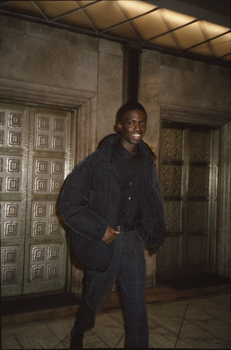 All smiles, Jeremiah Berko Fourdjour sports an all-black look from Pull & Bear.