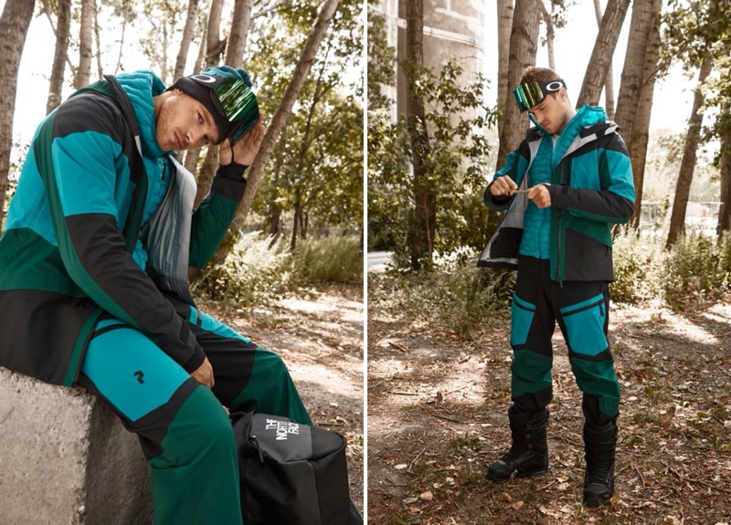 Front and center, Matthew Noszka wears a aqua-colored coat and snow pants from Peak Performance.