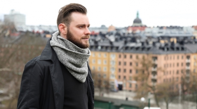 Nordic Fashion: How to Dress in the Most Utilitarian Way Possible? Stylish Man Knit Scarf Black Jacket Beard