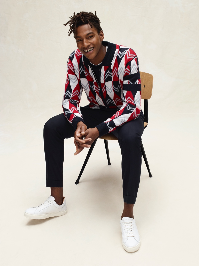 Ty Ogunkoya dons a half-zip graphic pullover from Tommy Hilfiger's spring-summer 2020 collection. » Adrien, O'Shea + More Don Tommy Hilfiger Spring '20 American Pioneers Collection Ty Ogunkoya dons a half-zip graphic pullover from Tommy Hilfiger's spring-summer 2020 collection.