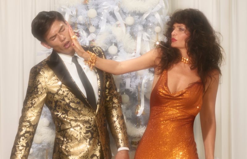 Slapping Simonas Pham, Helena Christensen makes an appearance in Versace's holiday 2019 campaign.