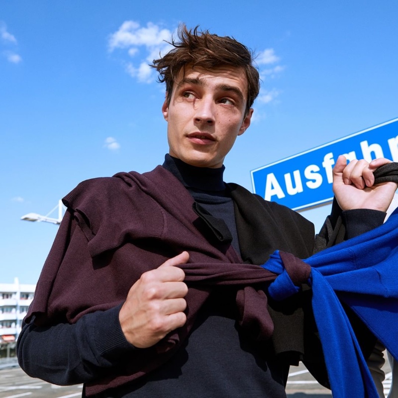 French model Adrien Sahores ties together a look from s.Oliver.