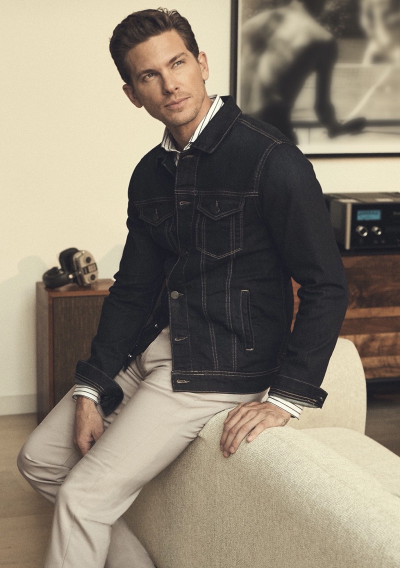 Adam Senn models 34 Heritage's Travis denim jacket and Charisma comfort-rise, classic fit pants.