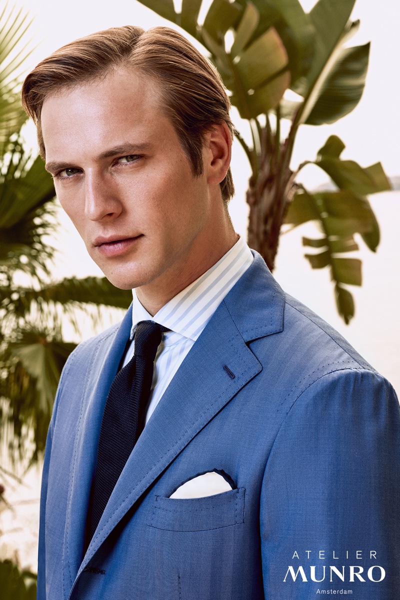 Jules Raynal dons an elegant blue suit for Atelier Munro's spring-summer 2020 campaign.