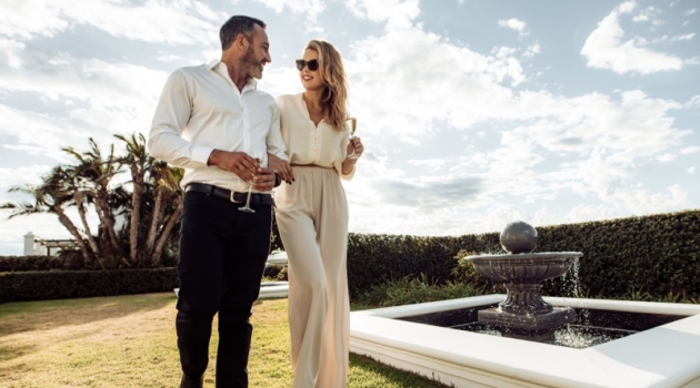 6 Top Fashion Must-Haves For Spring Attractive Couple Outdoors Fashionable Champagne Glasses