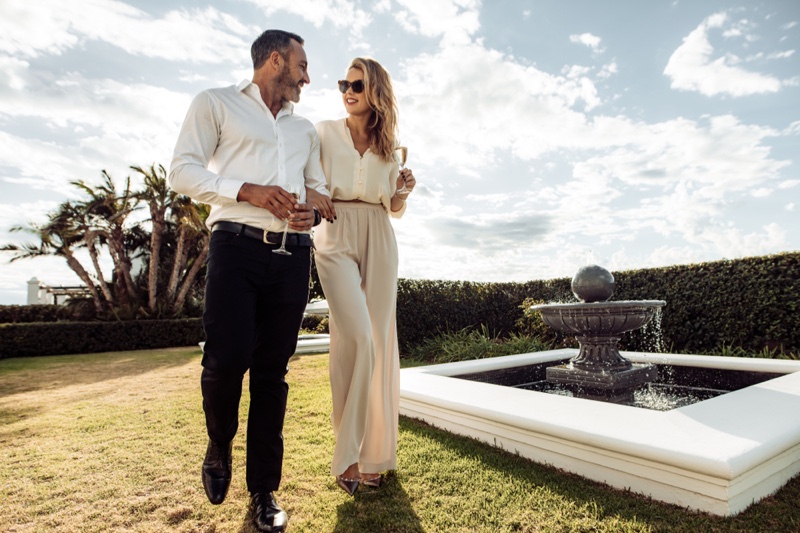 Attractive Couple Outdoors Fashionable Champagne Glasses Attractive Couple Outdoors Fashionable Champagne Glasses