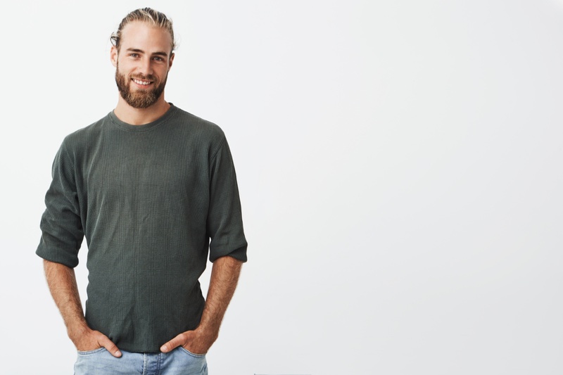 Blond Male Model Grey Sweater Smiling Hands Pockets Blond Male Model Grey Sweater Smiling Hands in Pocket