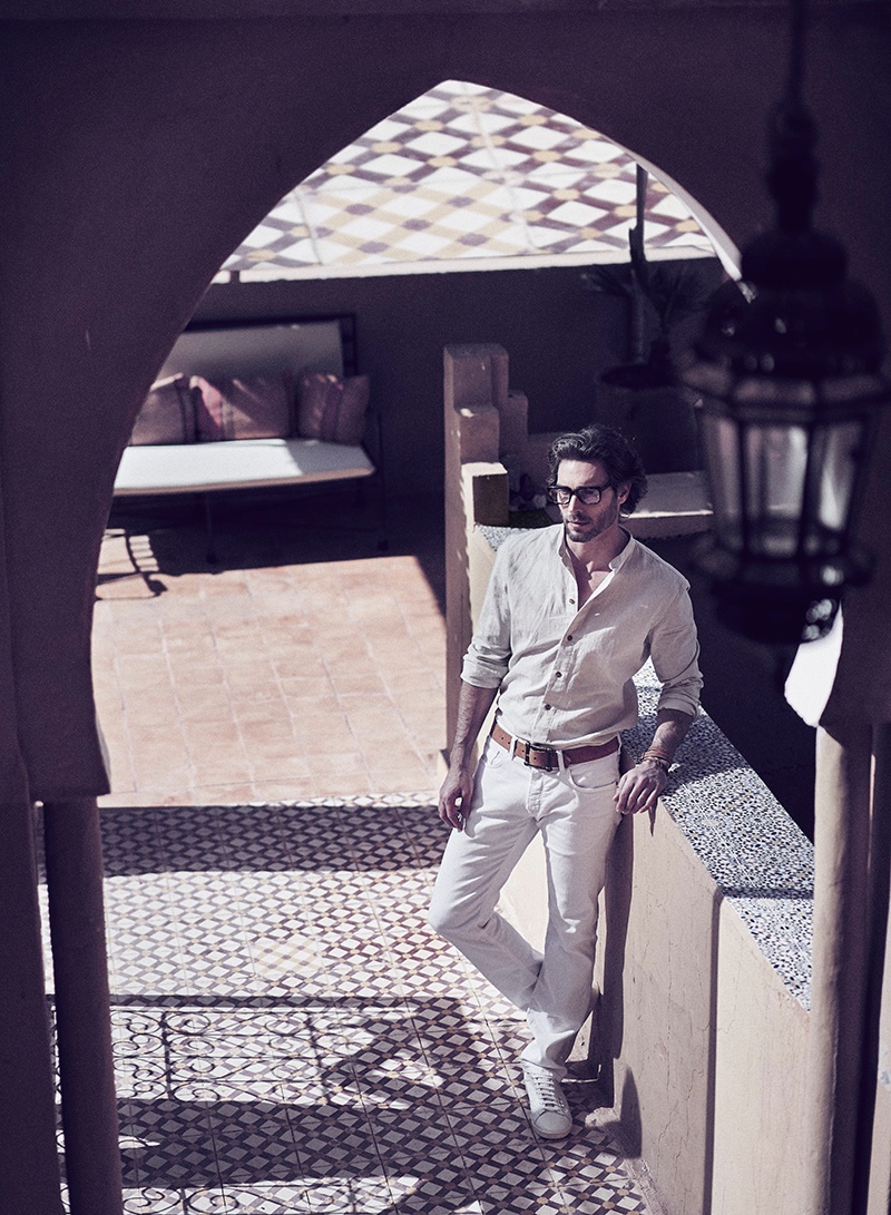 Donny wears pants Zegna, shirt YOOX, sneakers Superga, glasses Cutler & Gross, belt Vintage Love, and bracelet Hermès.