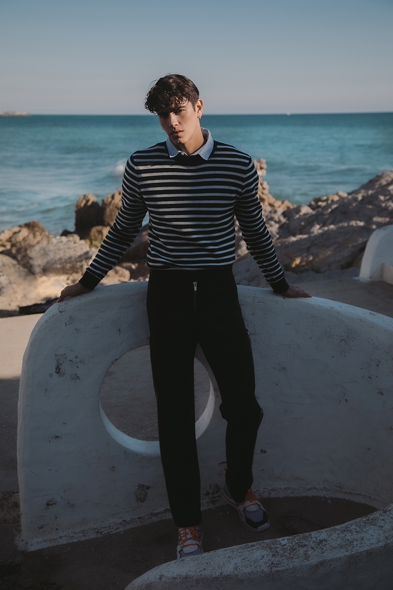 Sergio wears pants Violera Arellano, sweater Scotch & Soda, and shirt Tommy Hilfiger.